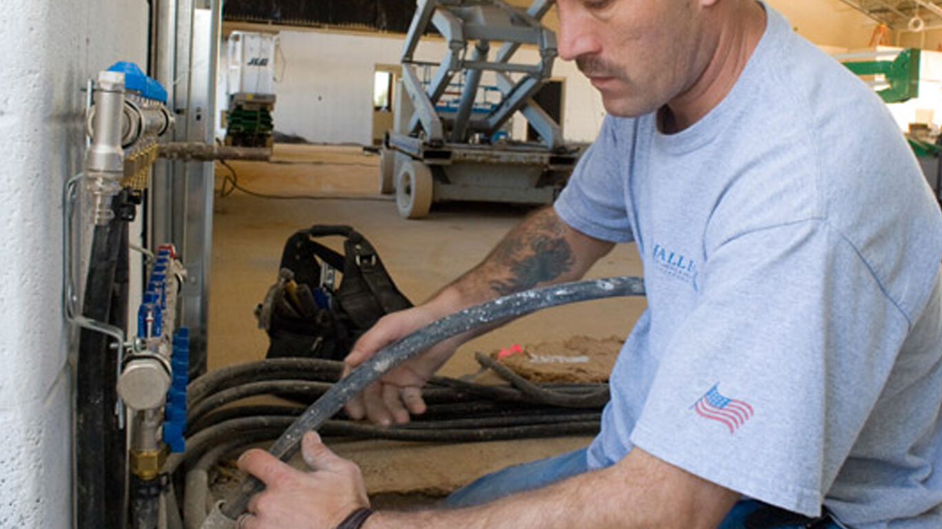 Man installing wiring.